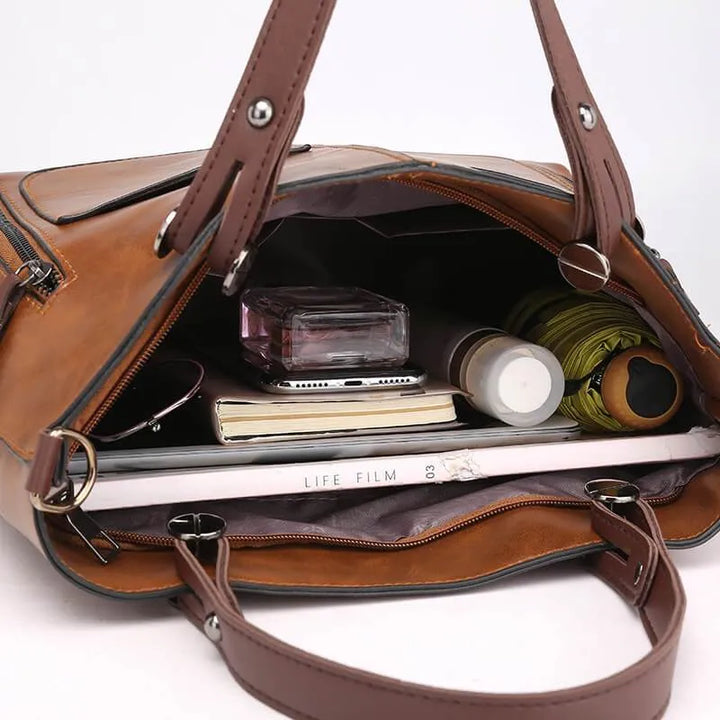 Fashionable gray women's tote bag, durable everyday carryall, versatile shoulder & crossbody accessory.