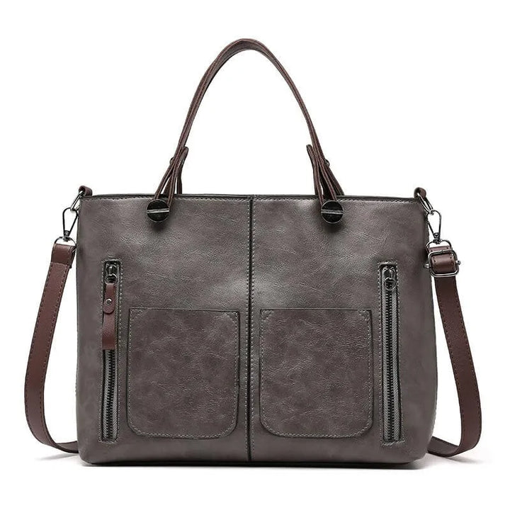 Everyday carryall tote for women, durable and versatile, converts to shoulder or crossbody.