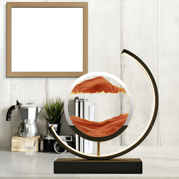 Elegant dynamic sand art desktop lamp with ambient light, a unique gift and soothing office decor.