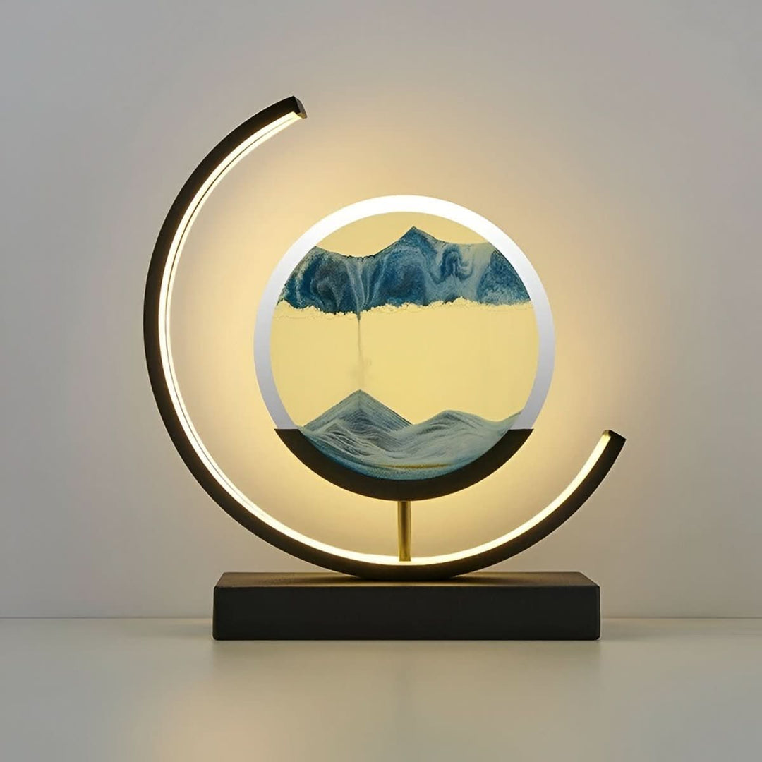 Illuminated dynamic sand art lamp with soft ambient LED glow, enhancing any room's decor.