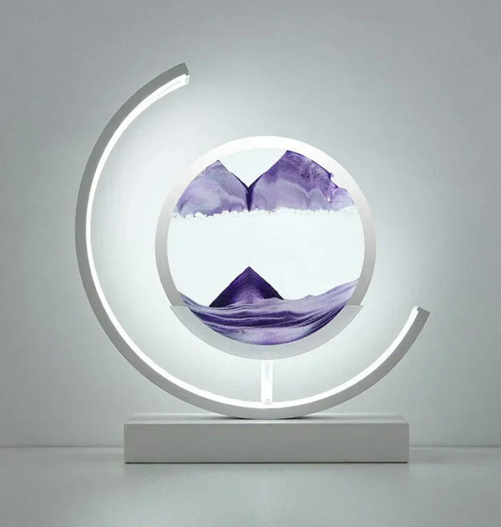 Unique sand art table lamp providing dynamic light, ideal for modern home or office decor and ambiance.