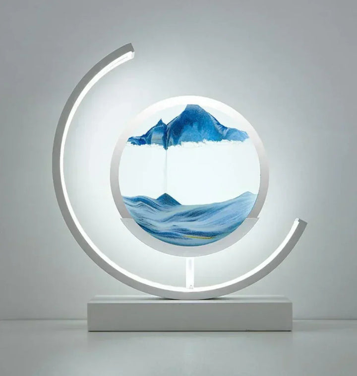 Mesmerizing flowing sand art lamp creates a dynamic light display for a calming and unique room ambiance.