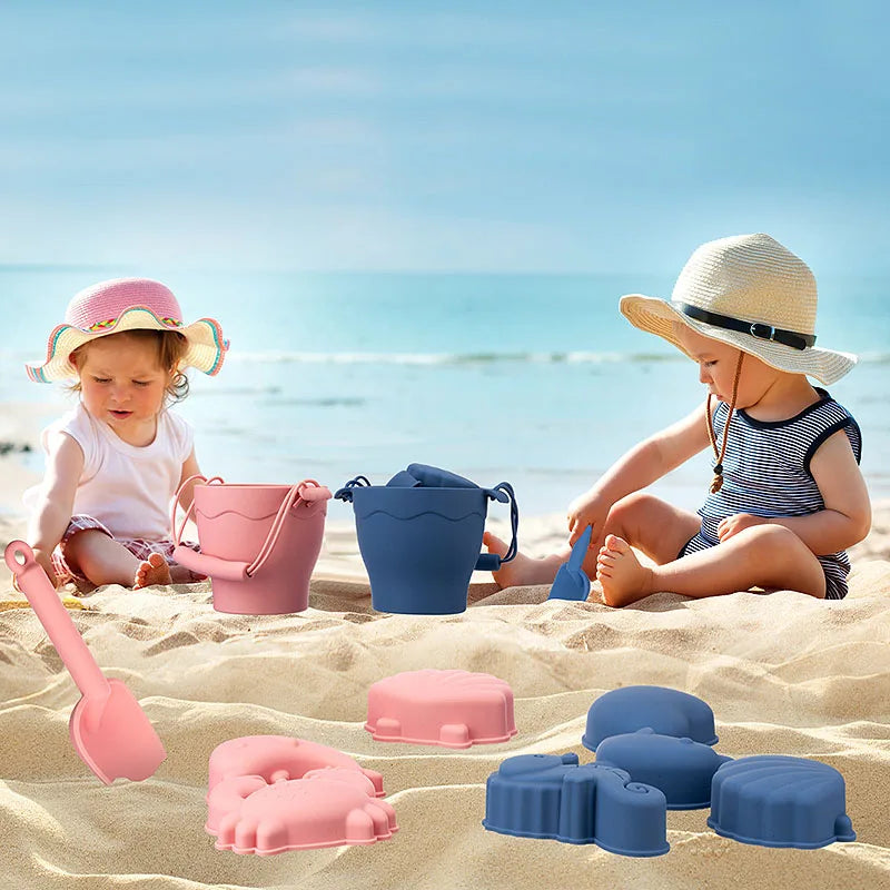 Children's durable silicone beach toy set with bucket, shovel, and animal sand molds, eco-friendly play.