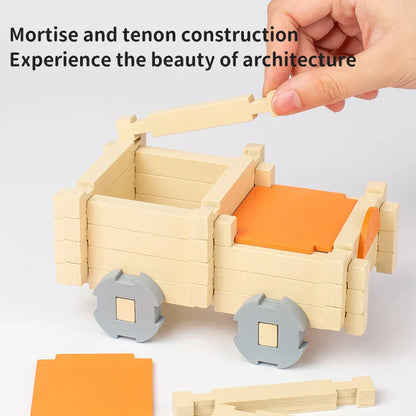 Children's hands assembling a mini house construction set, engaging STEM activity toy