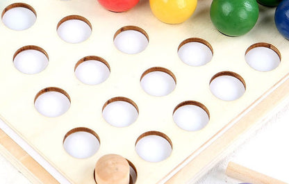 Kids learning through play with rainbow wooden beads and tweezers, enhancing concentration and fine motor skills.