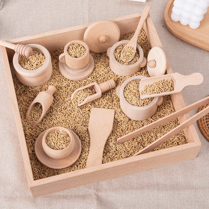Educational wooden sensory kitchen play set with stove, sink, and accessories for toddlers
