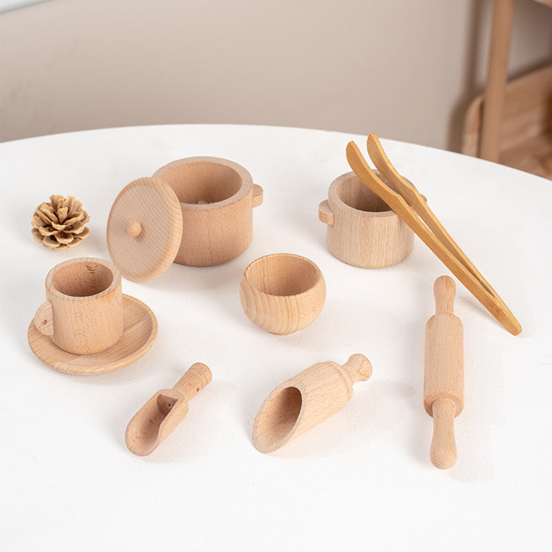 Complete wooden sensory kitchen with various utensils and food pieces for immersive play