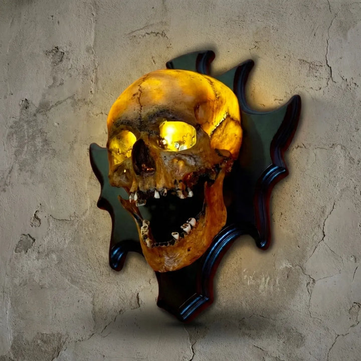 Detailed resin skull wall lamp, Nocturiskull, unique eerie lighting for spooky home decor. Perfect for gothic ambiance.