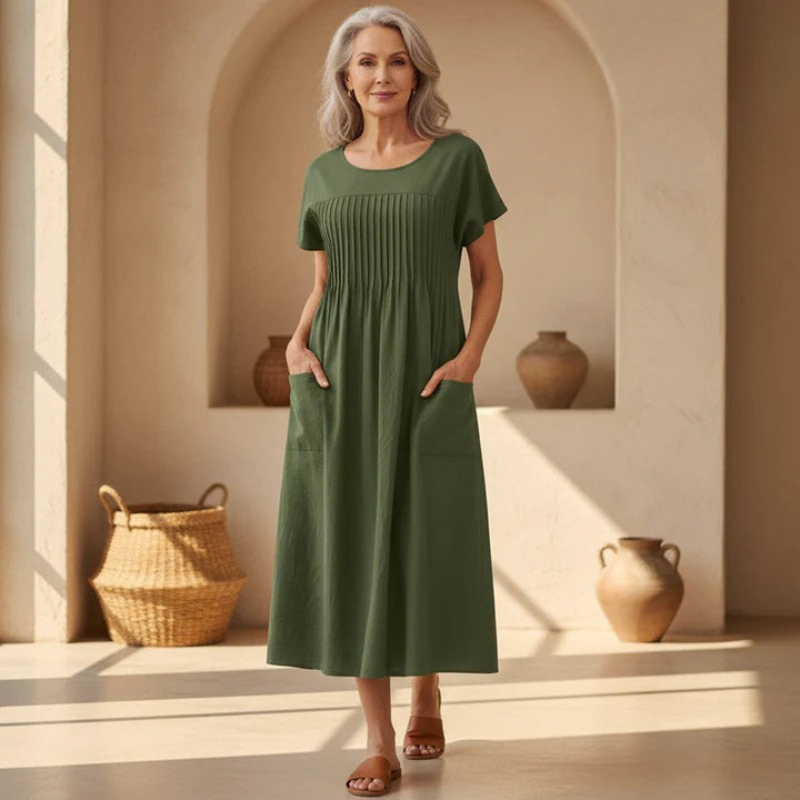 Effortless Women's Casual Relaxed Fit Midi Dress in a vibrant color, perfect for summer days. Comfortable and versatile.