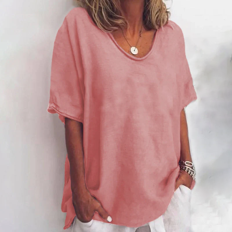 Effortless women's loose fit summer t-shirt with a comfortable round neck, perfect for everyday casual style.