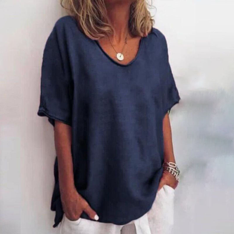 Loose fit women's summer shirt, a comfortable short sleeve t-shirt designed for effortless everyday style.