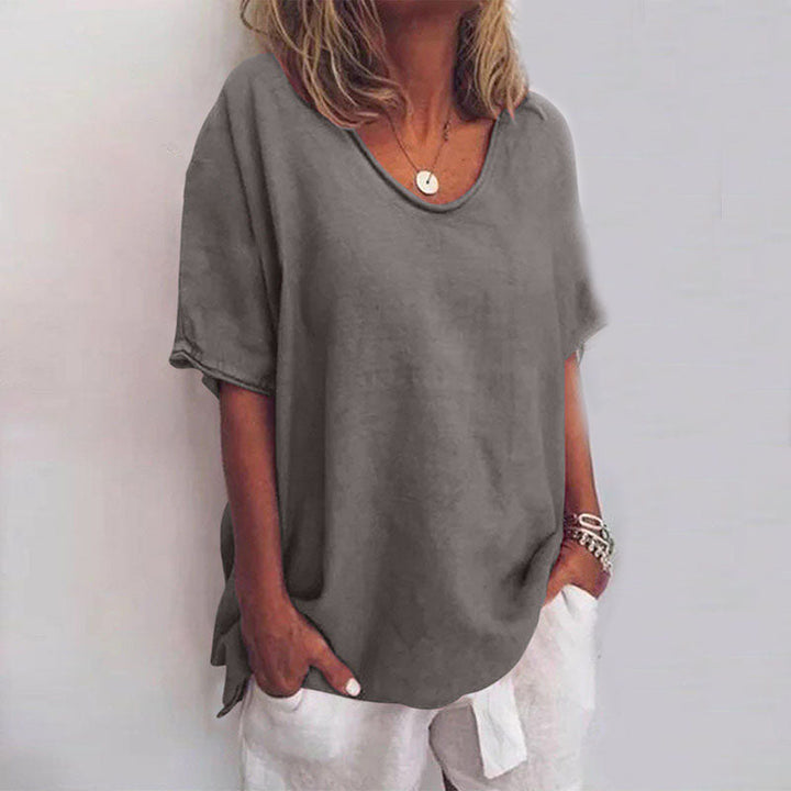 Versatile women's relaxed fit t-shirt with a classic round neck, great for comfortable summer fashion.