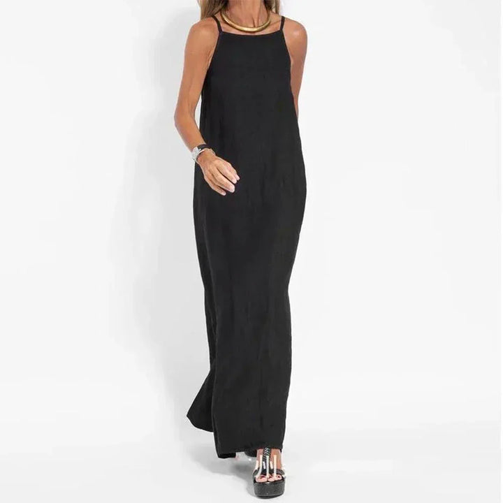 Black women's sleeveless maxi dress, relaxed fit. Versatile casual summer dress, comfortable for everyday wear.