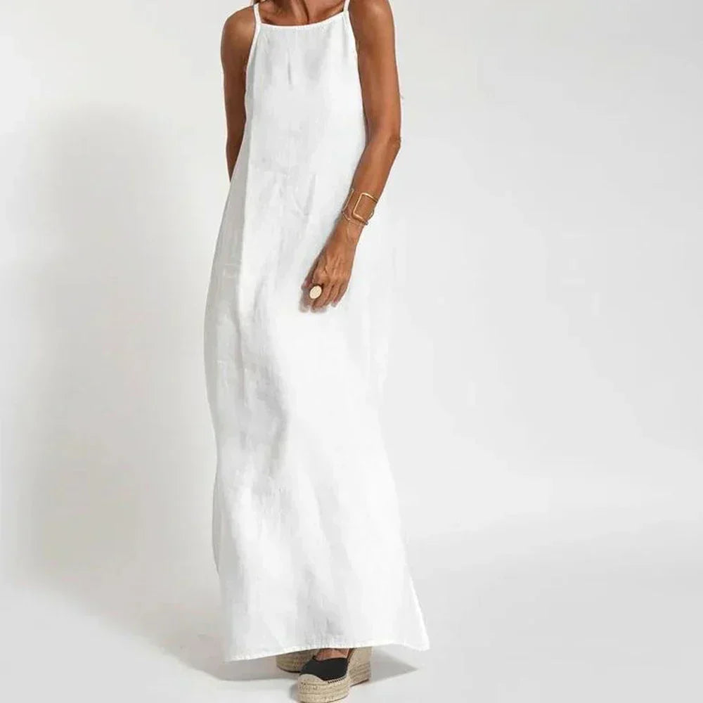 Comfortable white sleeveless maxi dress for women, relaxed fit. Perfect casual summer dress for effortless everyday style.