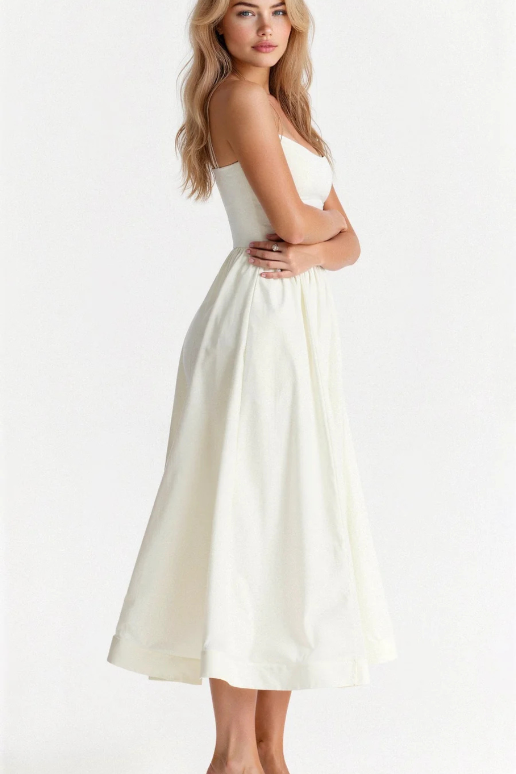 Feminine women's spaghetti strap sundress, effortless midi dress for vacation fashion.