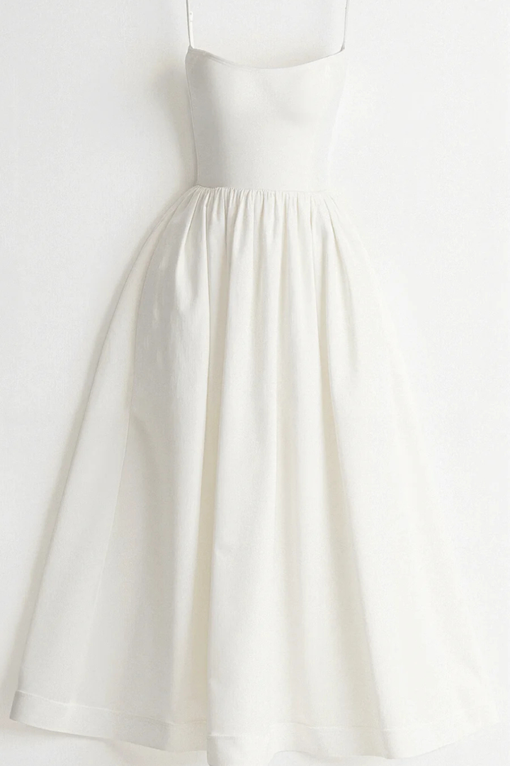 Gorgeous women's midi sundress with spaghetti straps, perfect for any summer occasion.