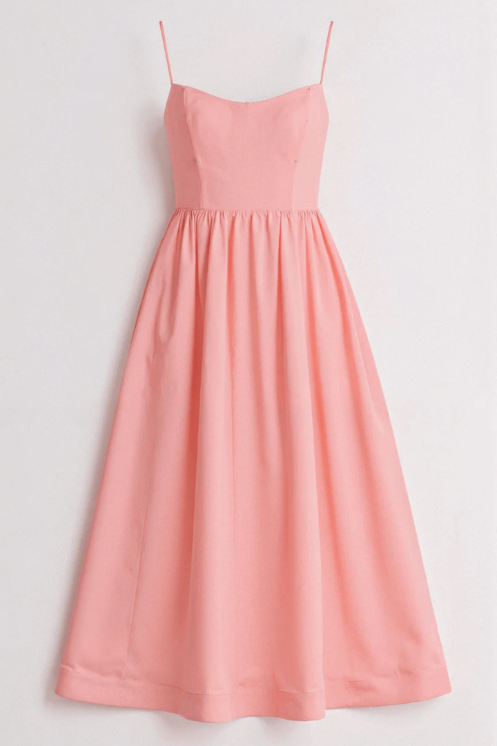 Sleeveless women's midi sundress with spaghetti straps, effortless & elegant summer style.