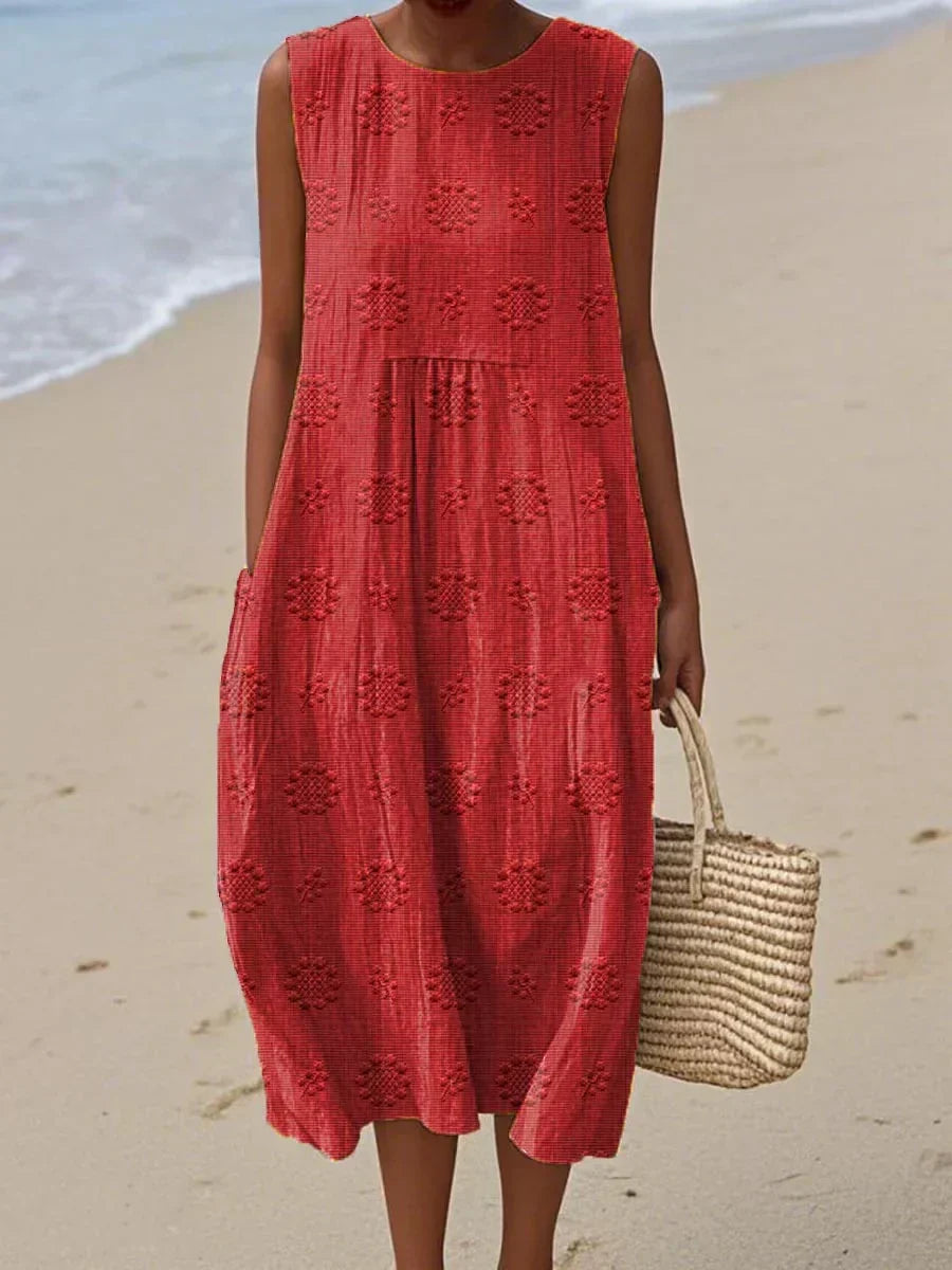 Women's casual summer midi dress with pockets. Sleeveless & flowy for effortless warm weather everyday wear.