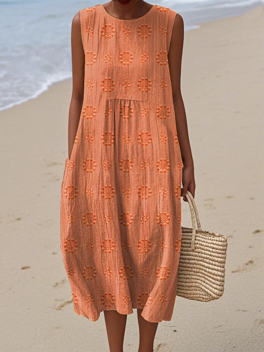 Stylish women's sleeveless midi dress with functional pockets. Relaxed, flowy design for summer comfort.
