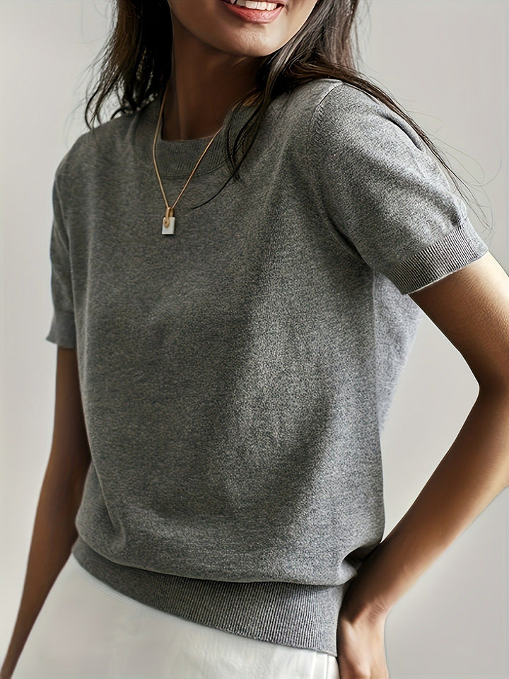 Effortlessly chic women's crew neck short sleeve knit top for casual everyday wear.