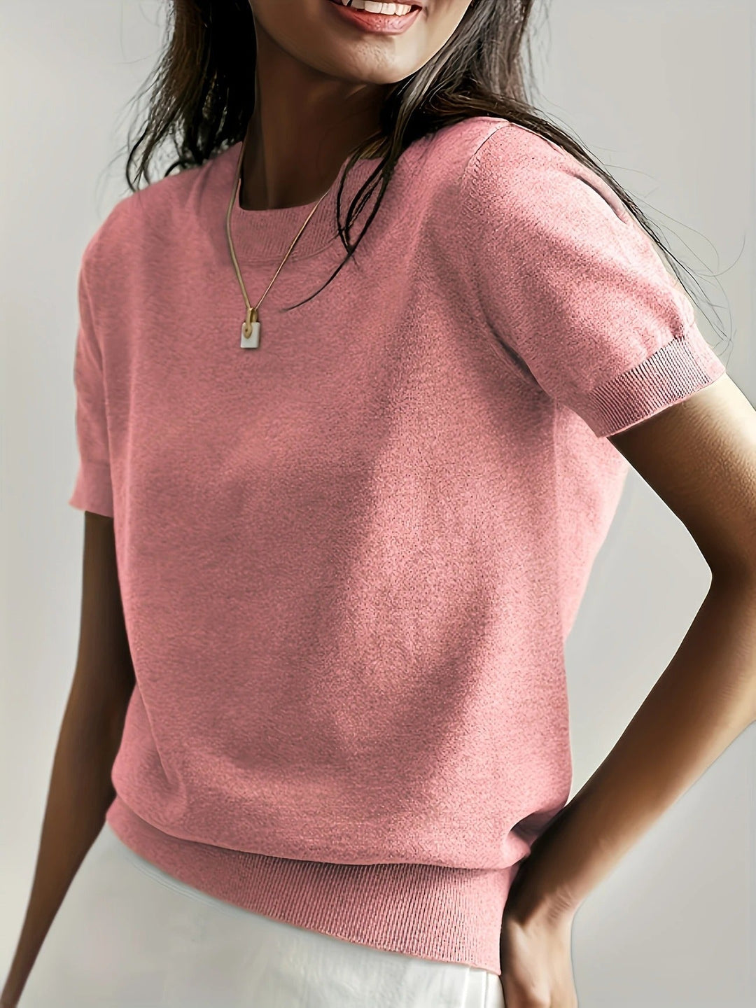 Women's effortlessly chic short sleeve top with a classic crew neck, relaxed fit.