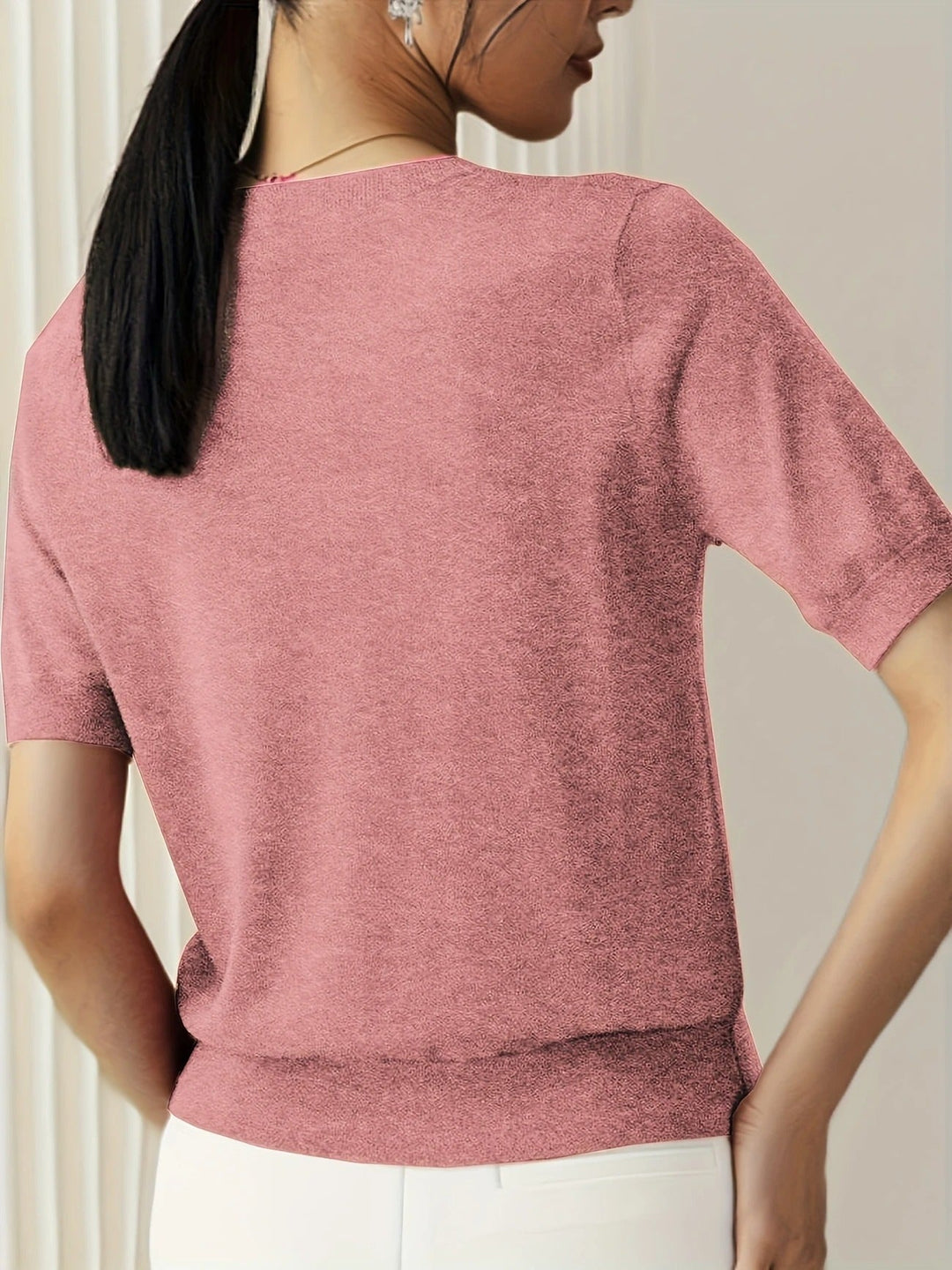 Versatile women's short sleeve knit top, crew neck, ideal for everyday comfort.