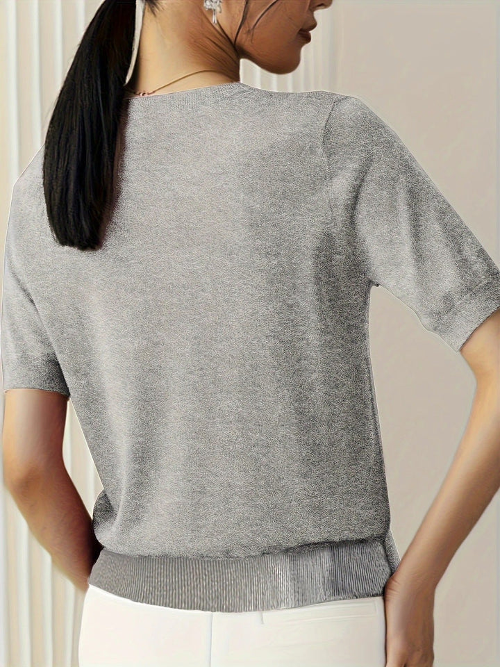 Women's chic short sleeve crew neck top, perfect for casual and versatile styling.