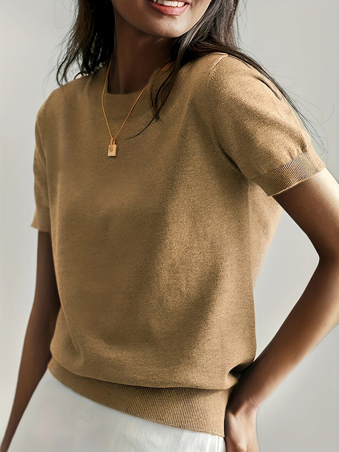 Comfortable women's knit short sleeve top with crew neck, relaxed fit everyday.