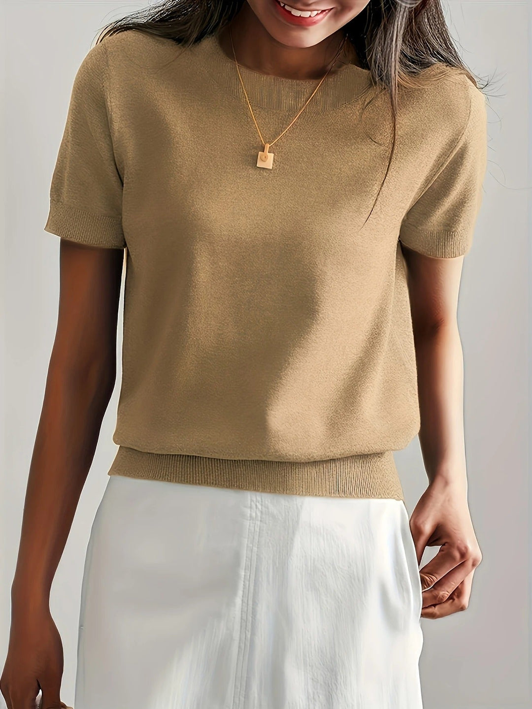 Effortlessly chic women's crew neck top, short sleeves, for everyday casual wear.