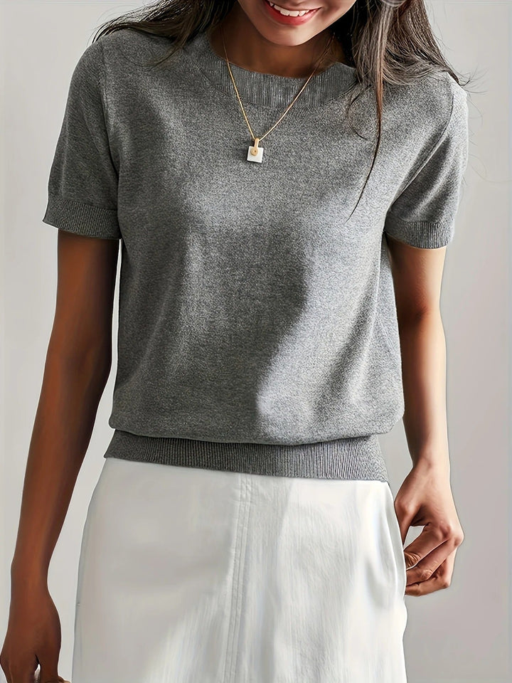Relaxed fit women's short sleeve crew neck tee, perfect for summer comfort & style.