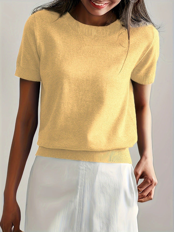 Women's casual knit crew neck top with short sleeves, chic and comfortable everyday.