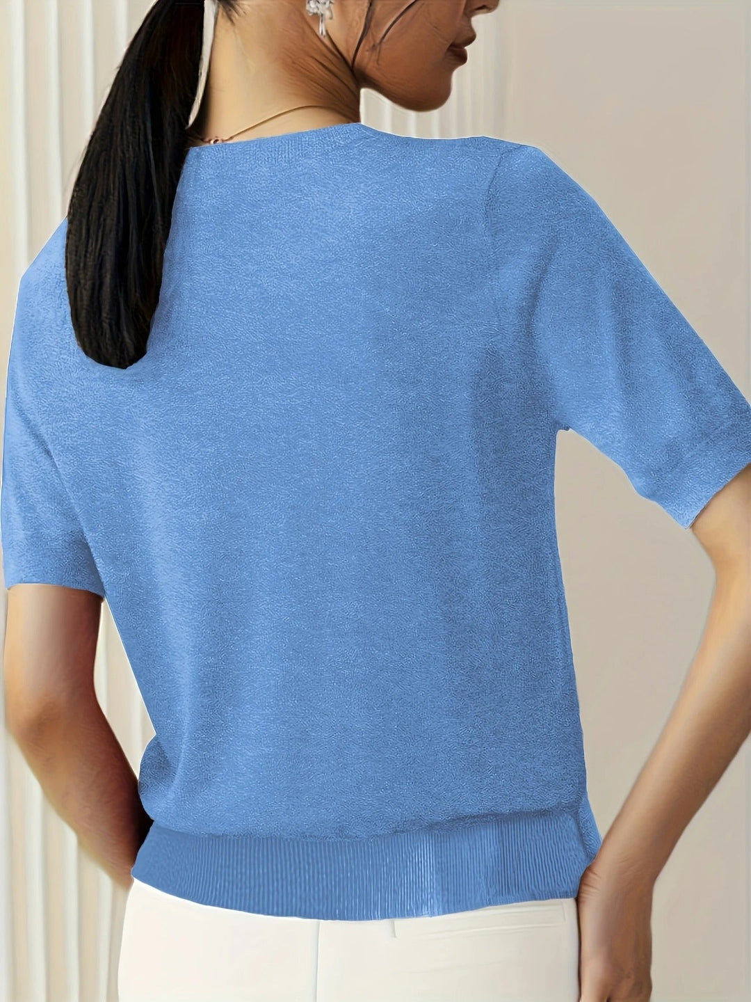 Chic women's short sleeve knit top, crew neck, effortlessly casual and versatile.