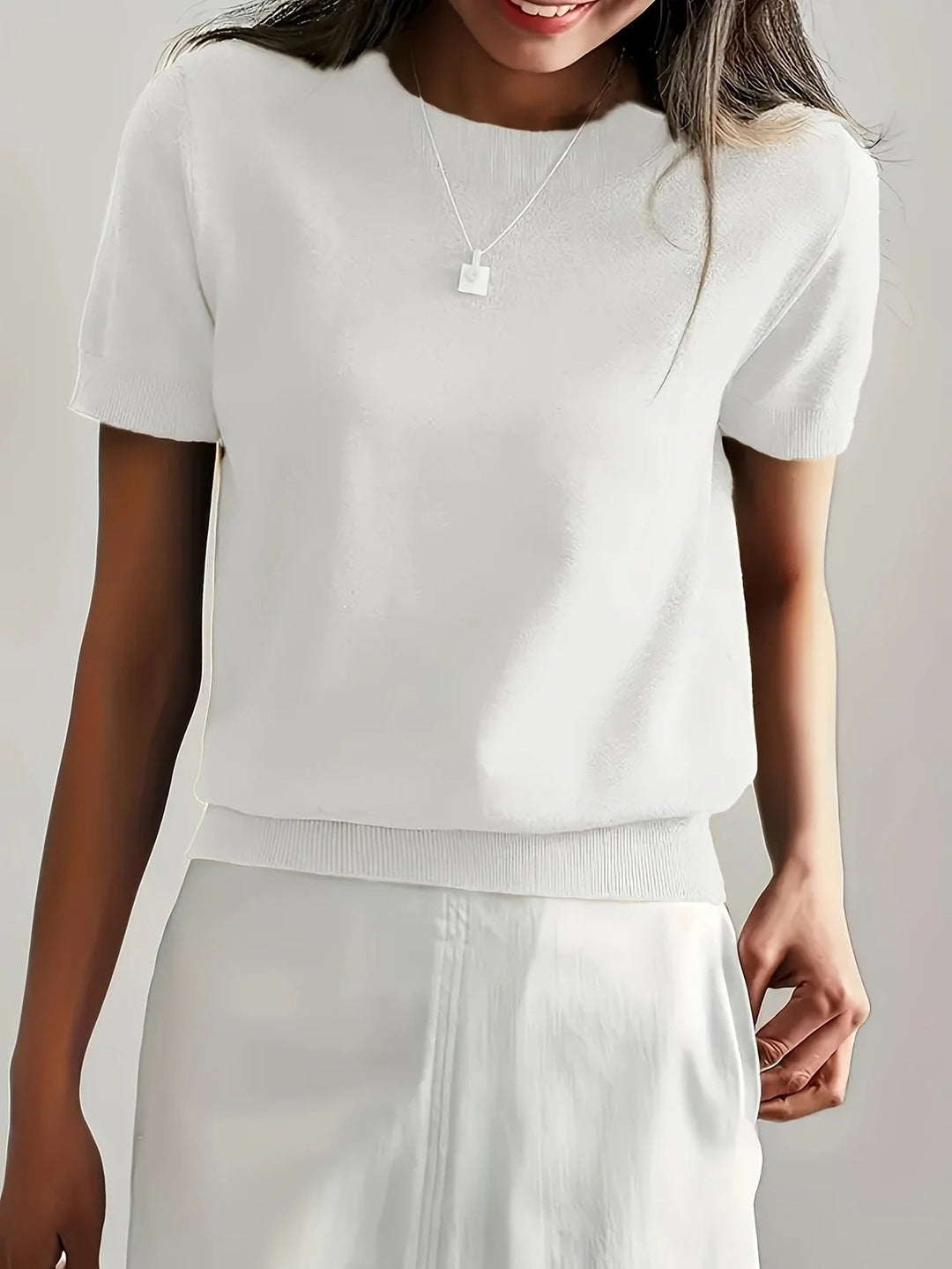 Versatile women's basic short sleeve tee, crew neck, ideal for summer chic style.