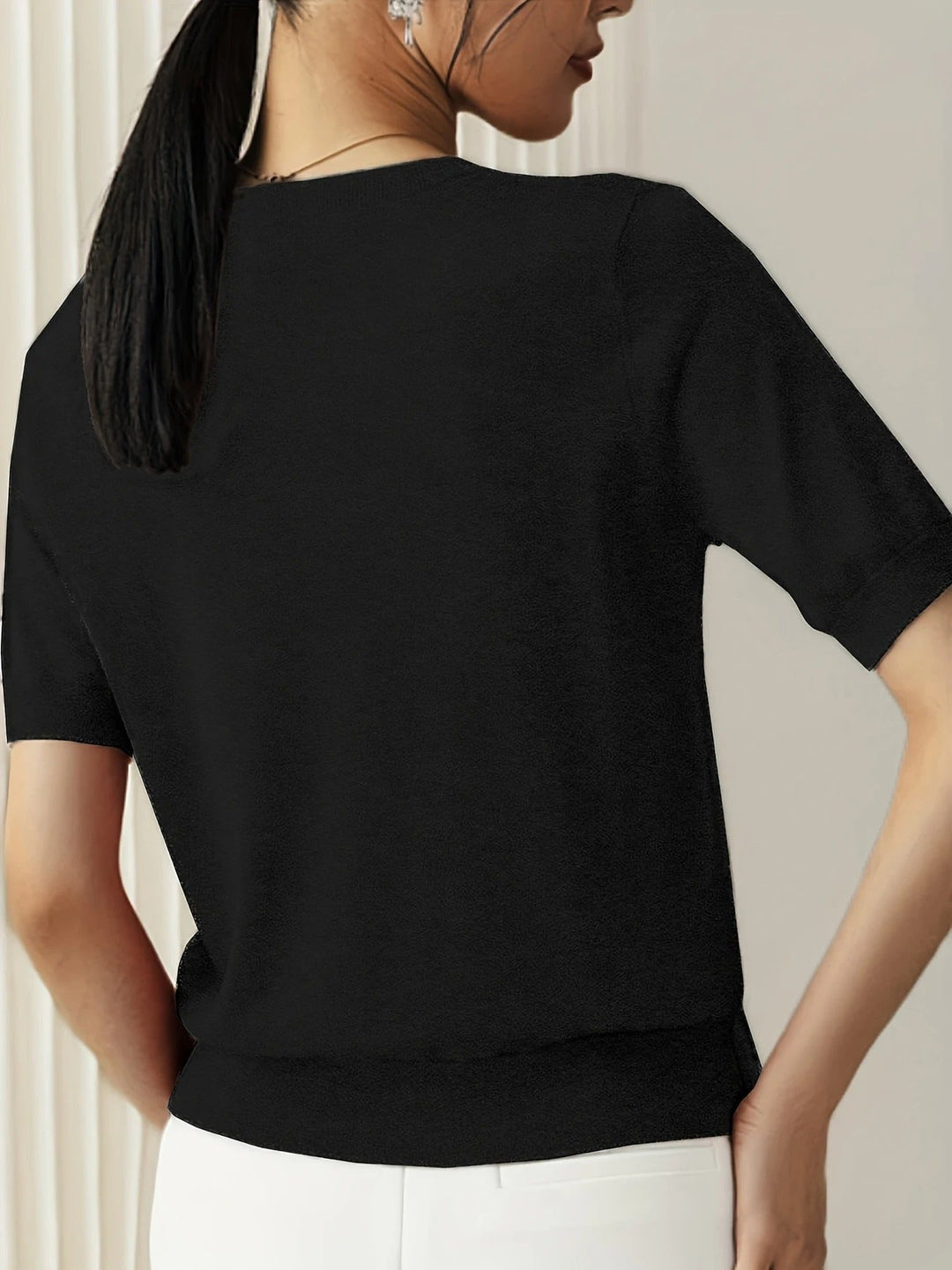Comfortable women's knit crew neck top, short sleeves, for chic casual summer style.