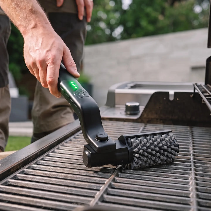 Electric cordless grill cleaning brush for outdoor BBQ grills, making maintenance easy and efficient.