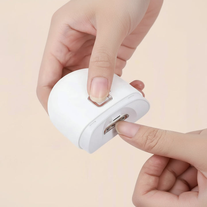 Rechargeable electric nail shaper for safe at-home nail care. Portable beauty device for perfect nails.