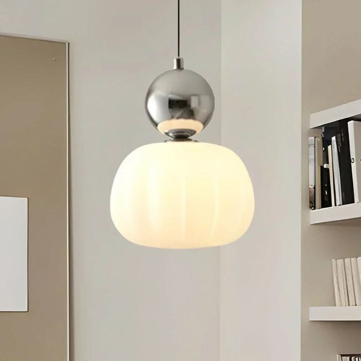 Elegant Art Deco ceiling pendant with a clean line design, perfect for kitchen islands.