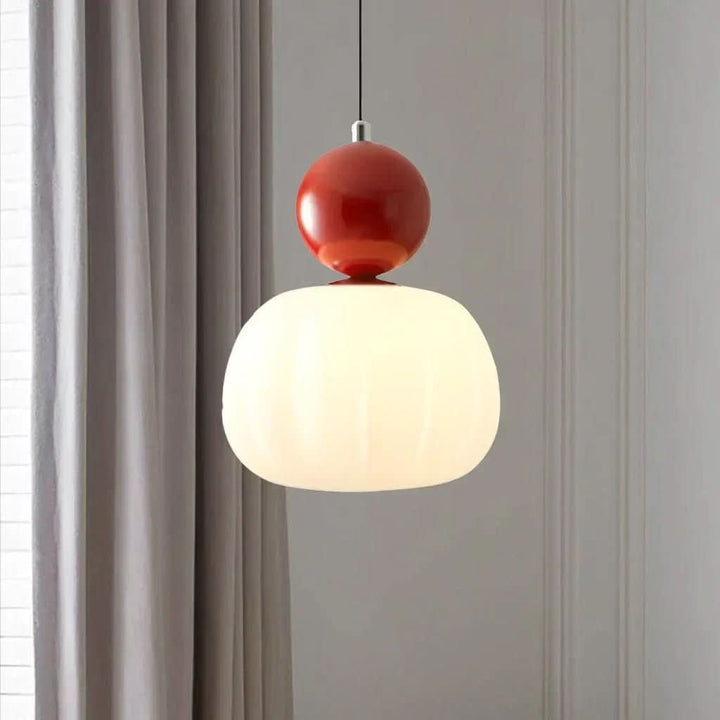 Ornate Art Deco pendant light, featuring unique patterns, perfect for stylish interior design.