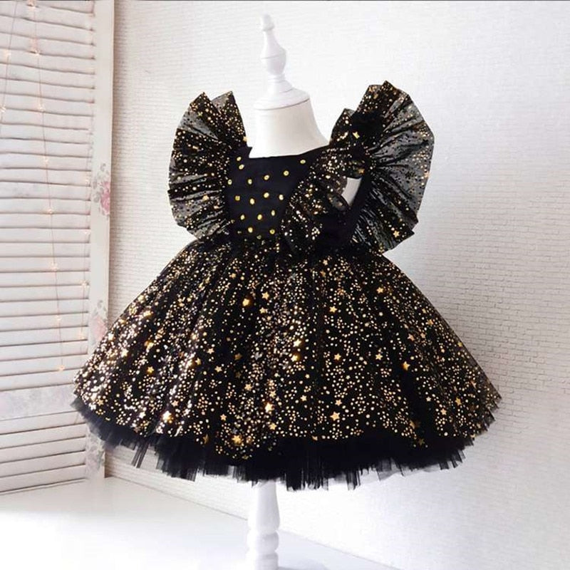 Formal baby girl dress, white, knee-length, featuring stylish puffy mesh sleeves for special occasions.