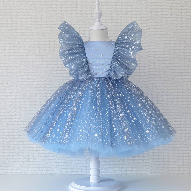 Elegant girls' clothing, white knee-length party dress with a distinctive puffy mesh sleeve design.