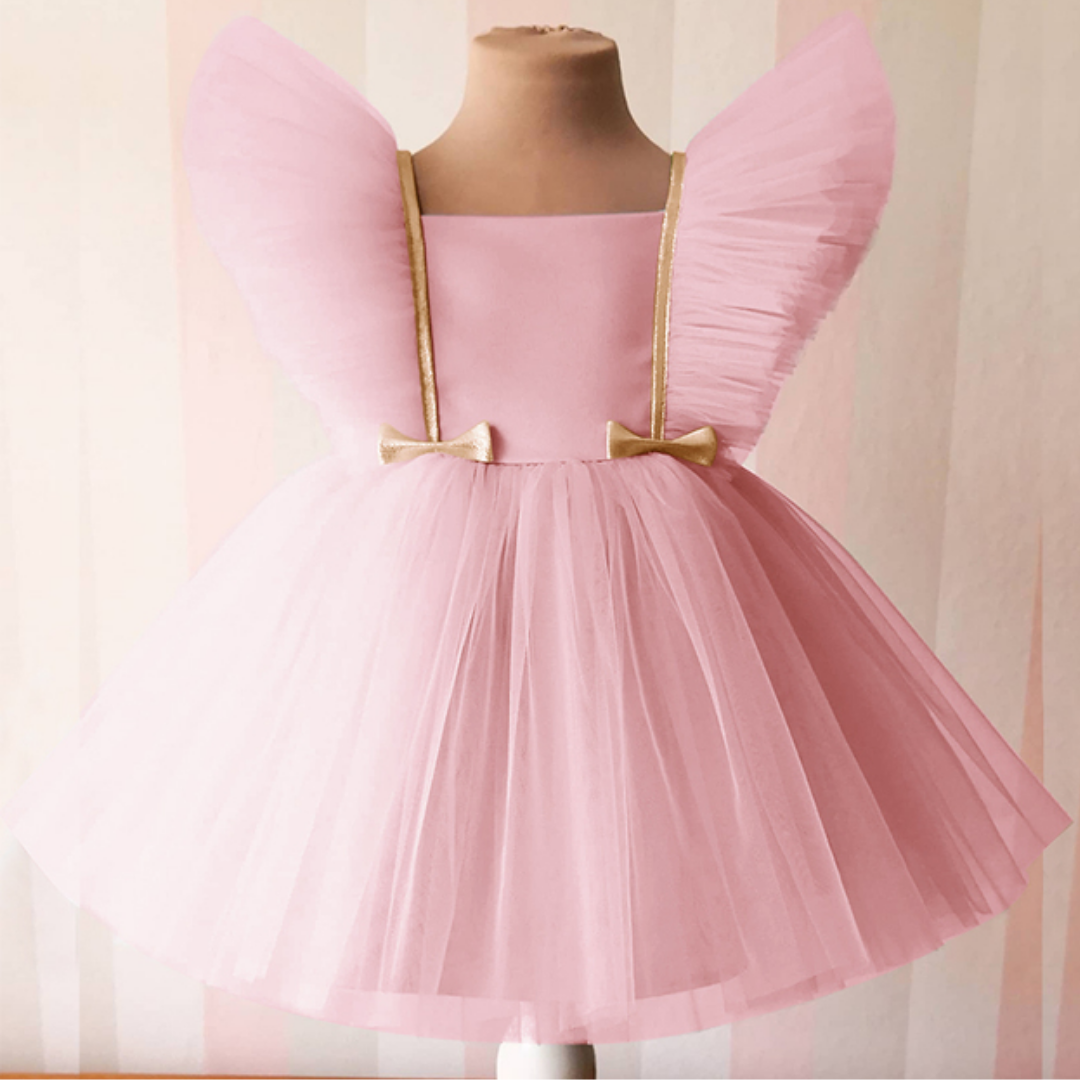 White knee-length infant girl dress with delicate mesh sleeves, perfect for special occasion wear.