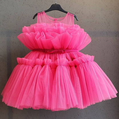 Knee-length girls' party dress with stylish puffy mesh sleeves, a beautiful formal wear option.