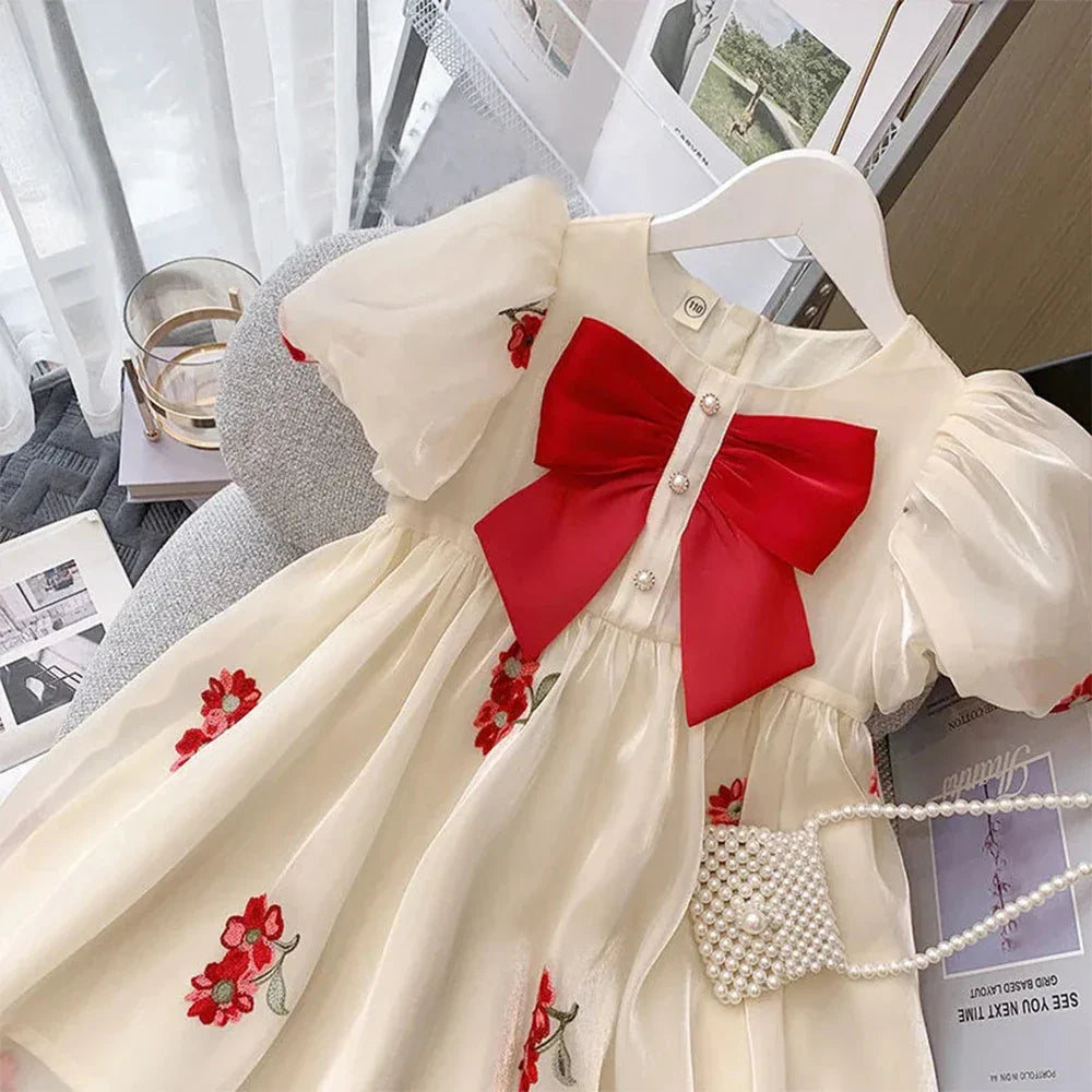 High-quality beige elegant dress for toddler girls, designed for comfort and style during summer events.