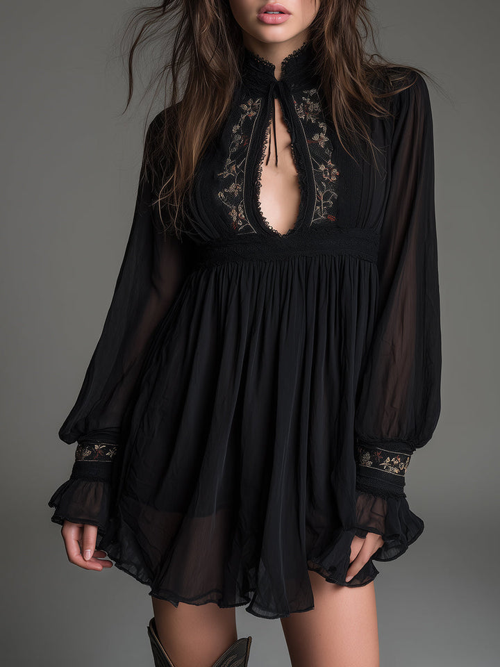 Elegant black babydoll mini dress for women, featuring a stylish keyhole neckline and fashionable balloon sleeves. Perfect for parties.