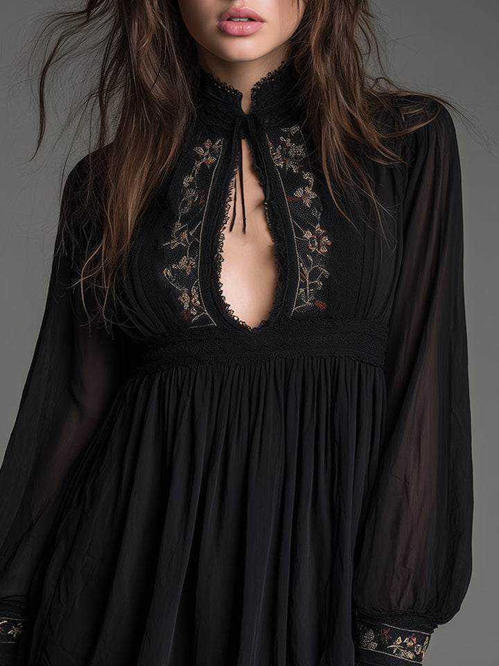 Women's stylish black babydoll mini dress with long balloon sleeves and keyhole detail. Ideal as an evening or cocktail dress.