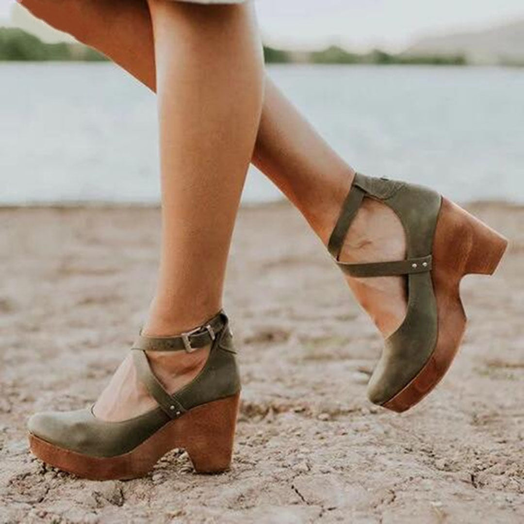 Fashionable green closed-toe wedge heels for women, providing comfort & an elegant design for everyday and office wear.