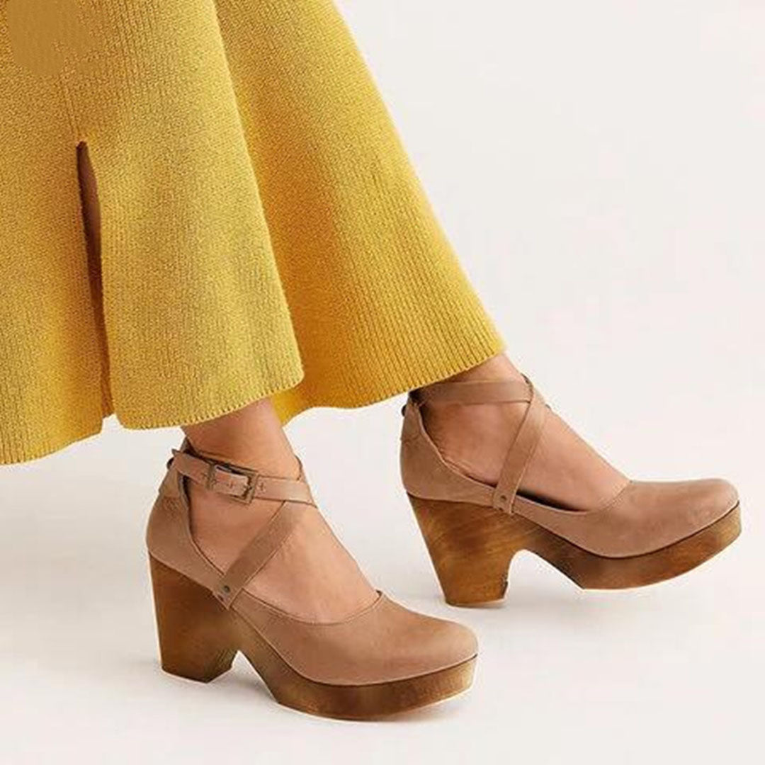 Versatile black wedge heels for women, offering elegant style & a comfortable closed-toe design for office & daily wear.