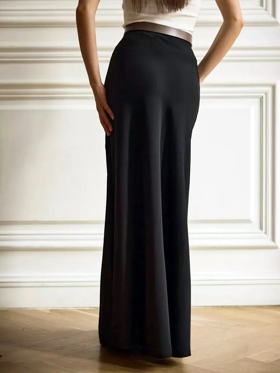 Sapphire blue high-waist fishtail maxi skirt, elegant and flattering for evenings.