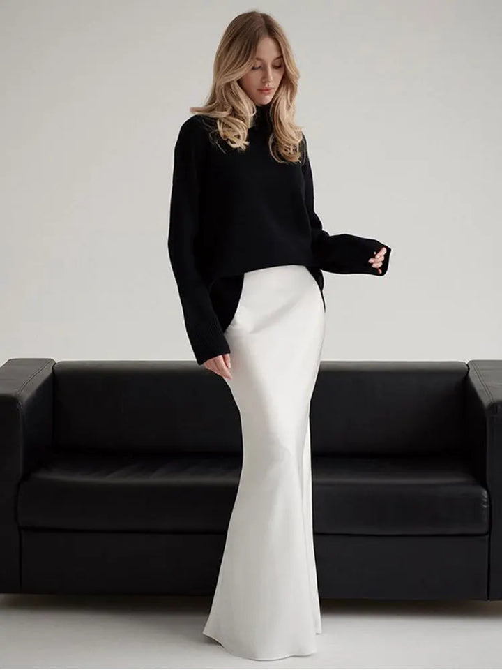 Deep forest green elegant fishtail maxi skirt, high-waisted for formal events.