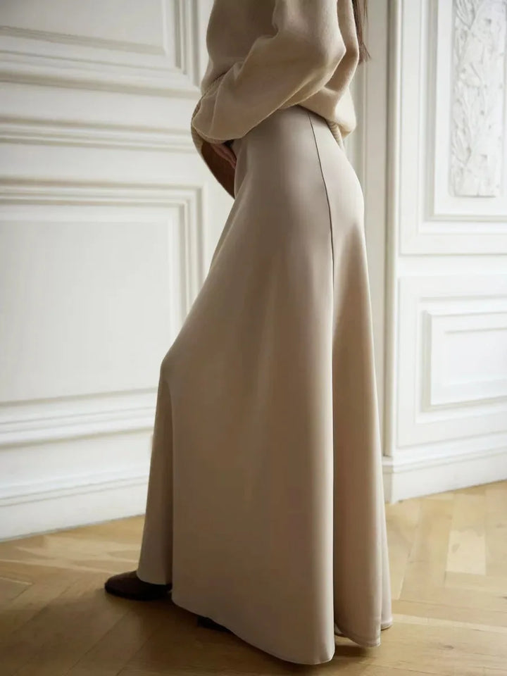 High-waist fishtail maxi skirt showcasing an elegant, flowing silhouette.